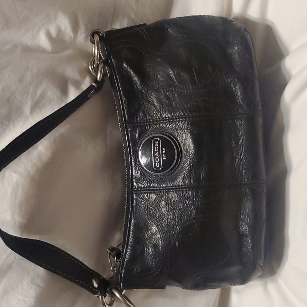 Black Moon shaped Coach bag÷